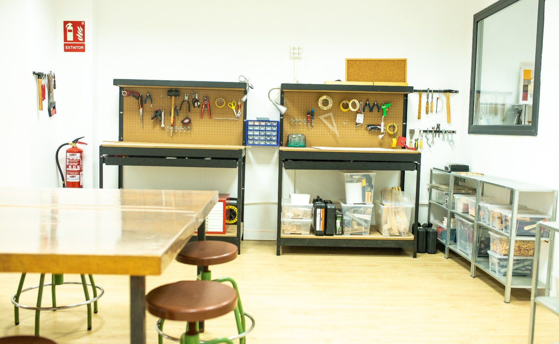 The Lab’s woodwork workshop, with the tools hanging on the wall