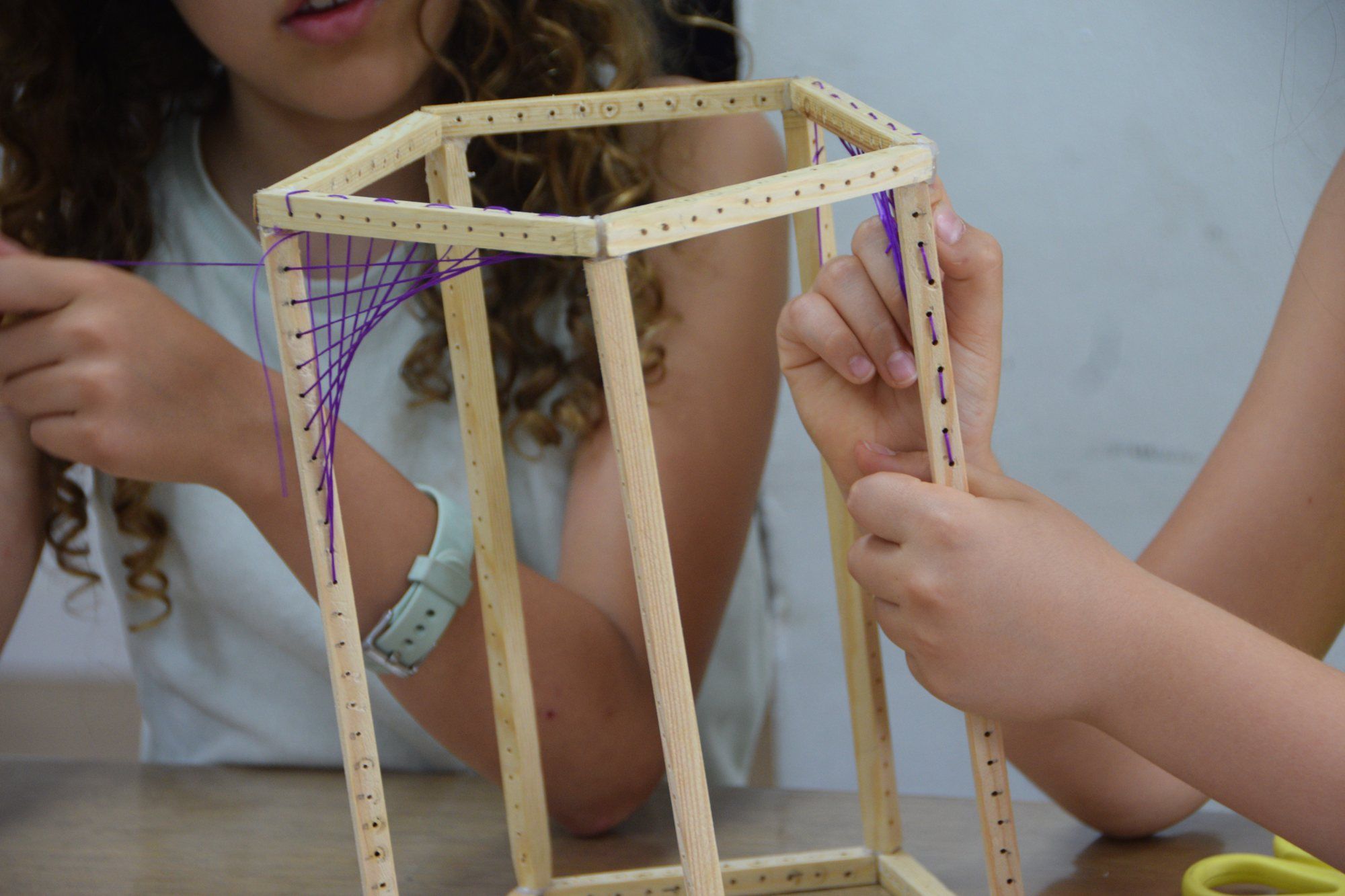 Building a hexagonal prism out of wood and thread